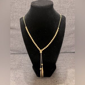 Gold tone necklace, up to 32” in length